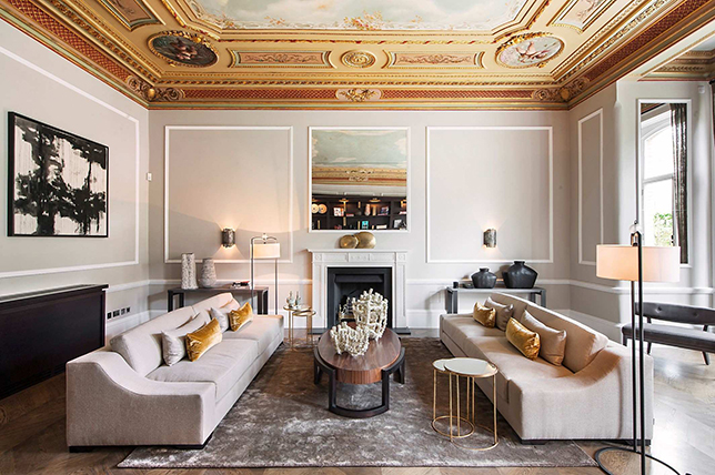 living room with a different height lighting scheme